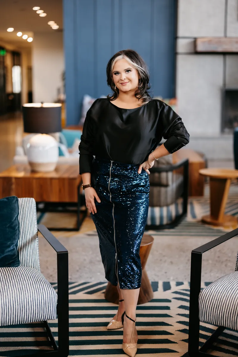 Hannah Blevins standing in a hotel lobby in Knoxville